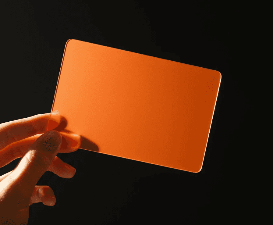 a hand holding a card